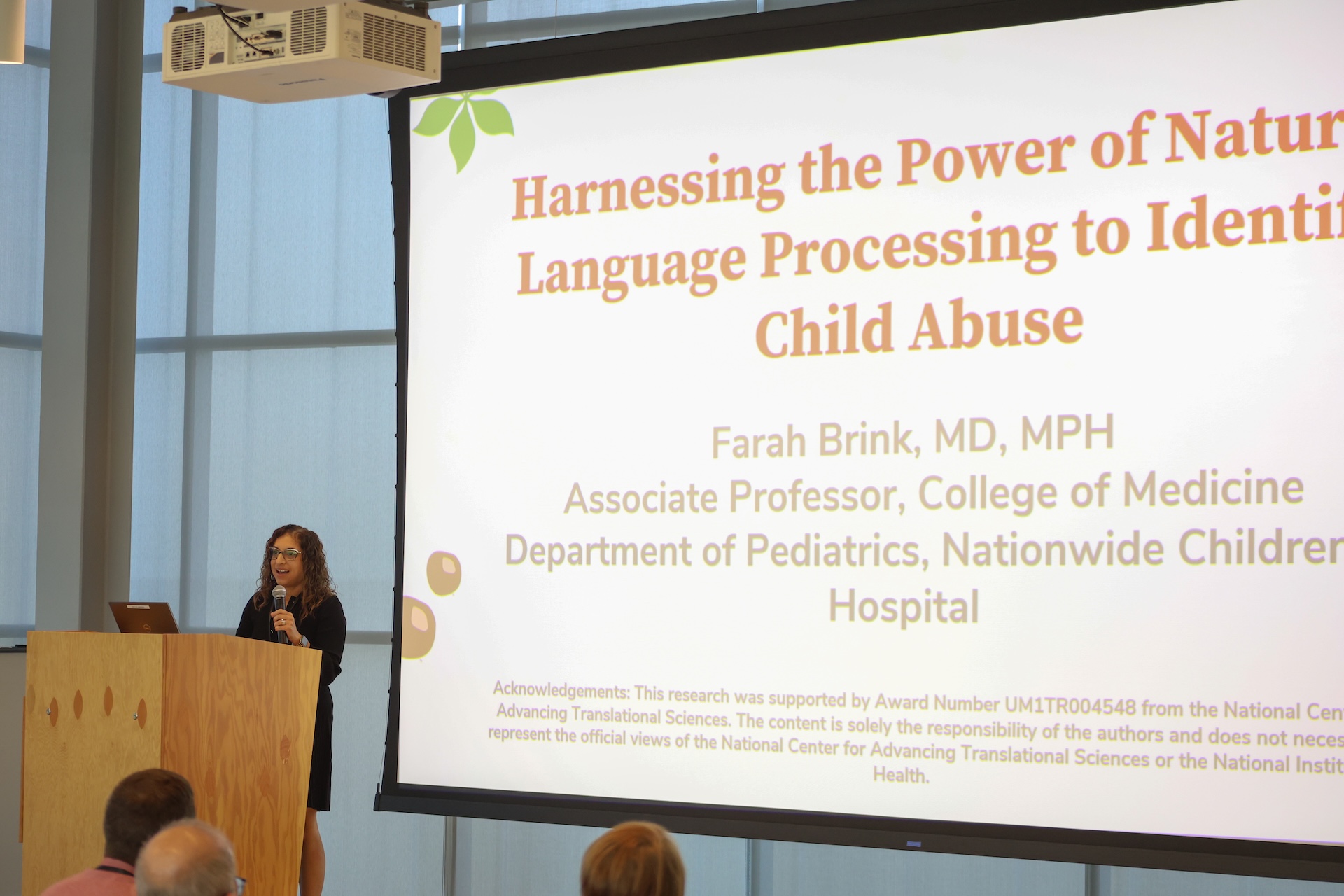 Farah Brink addressing attendees at the CTSI research showcase