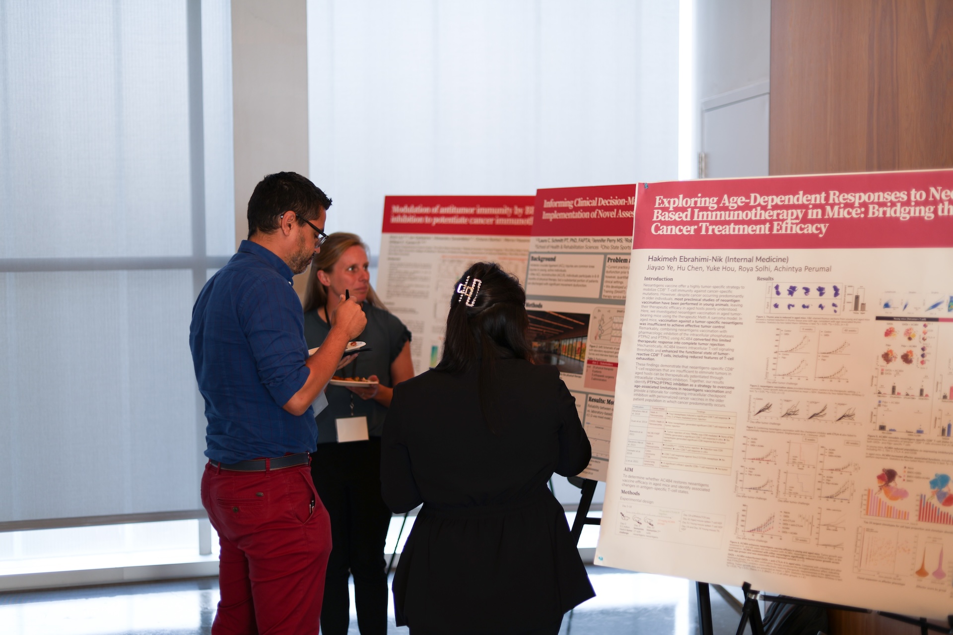 Participants interacting during a poster session