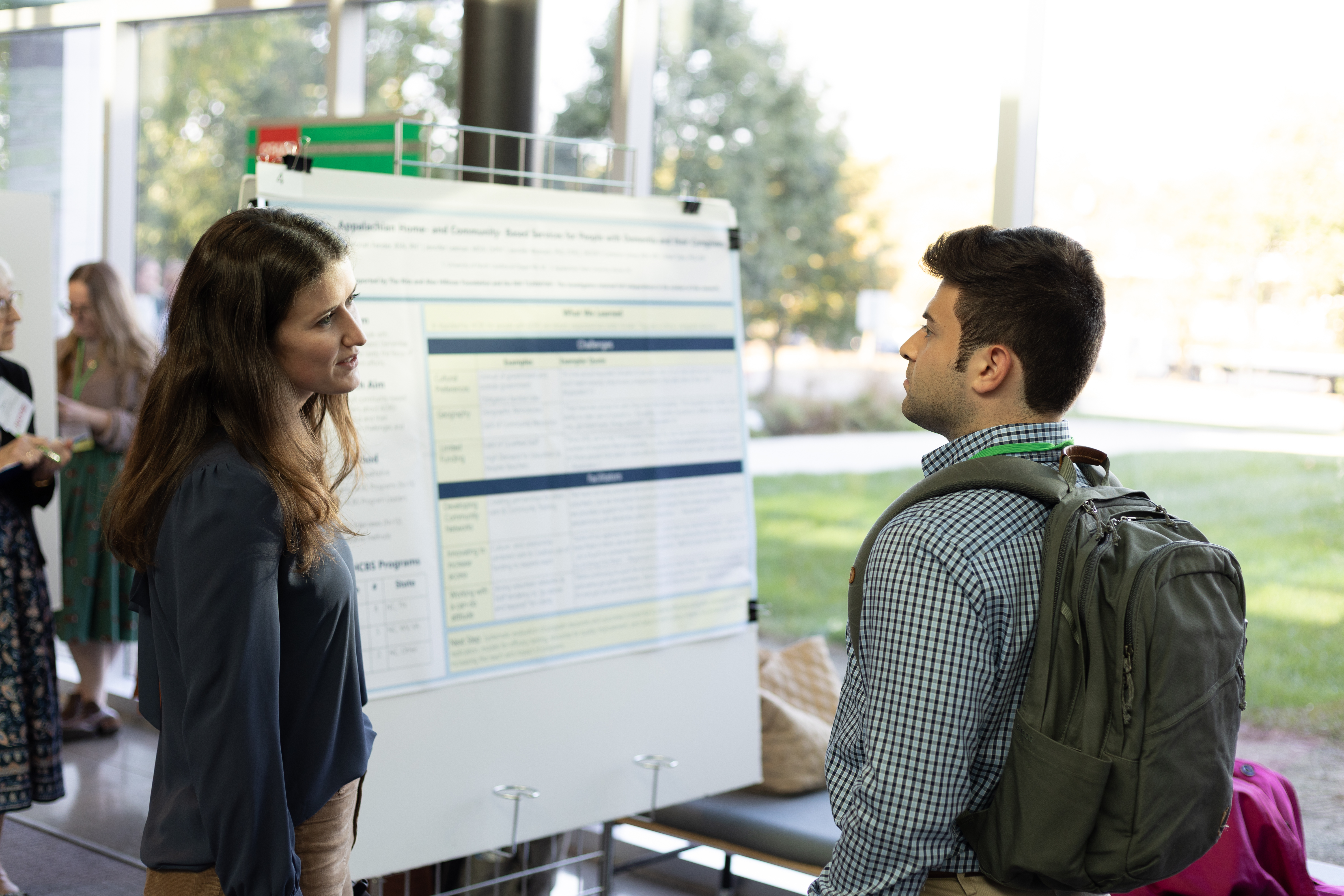 Participant interacting during the poster session