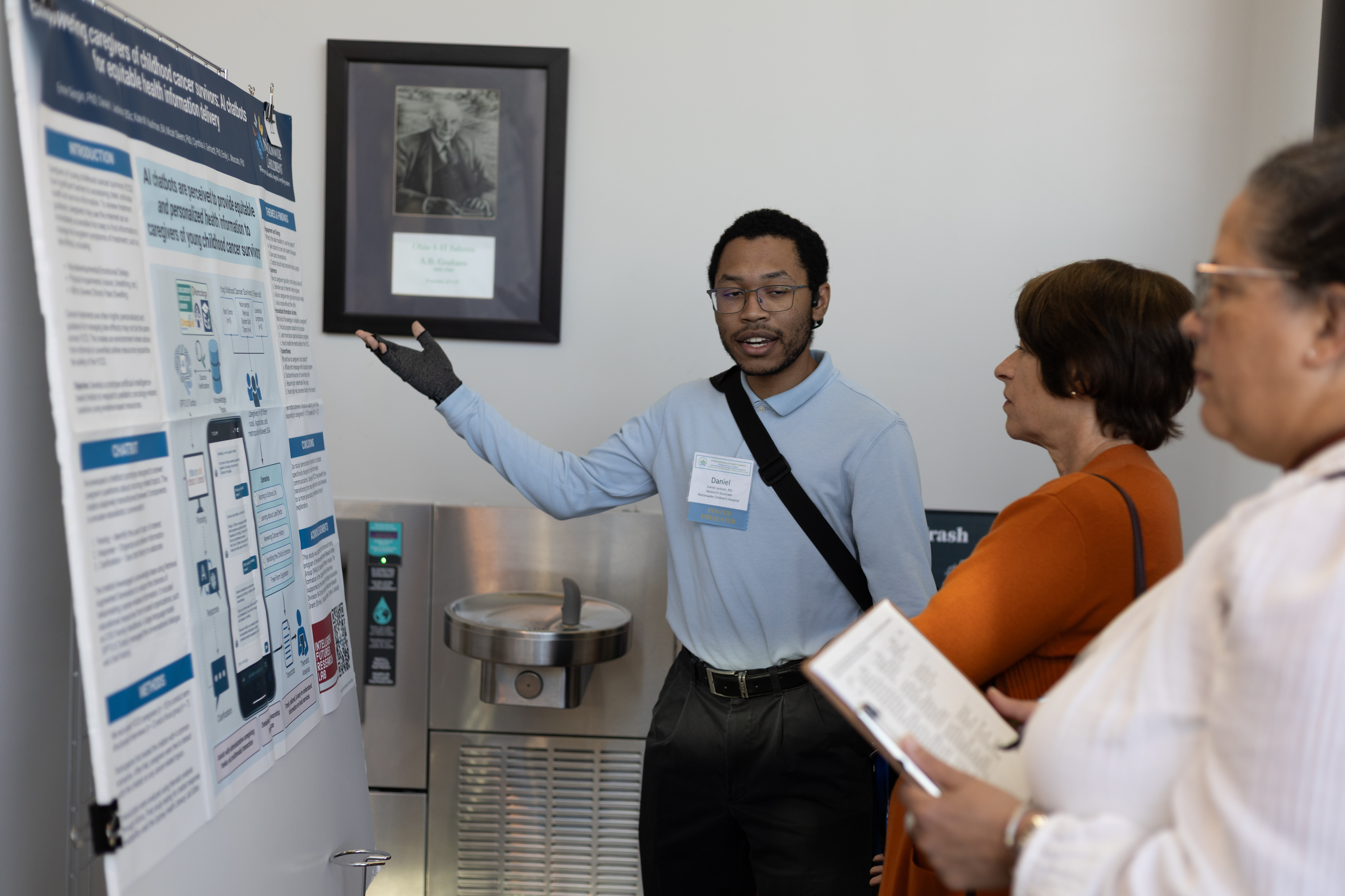 Poster presenting interacting with faculty