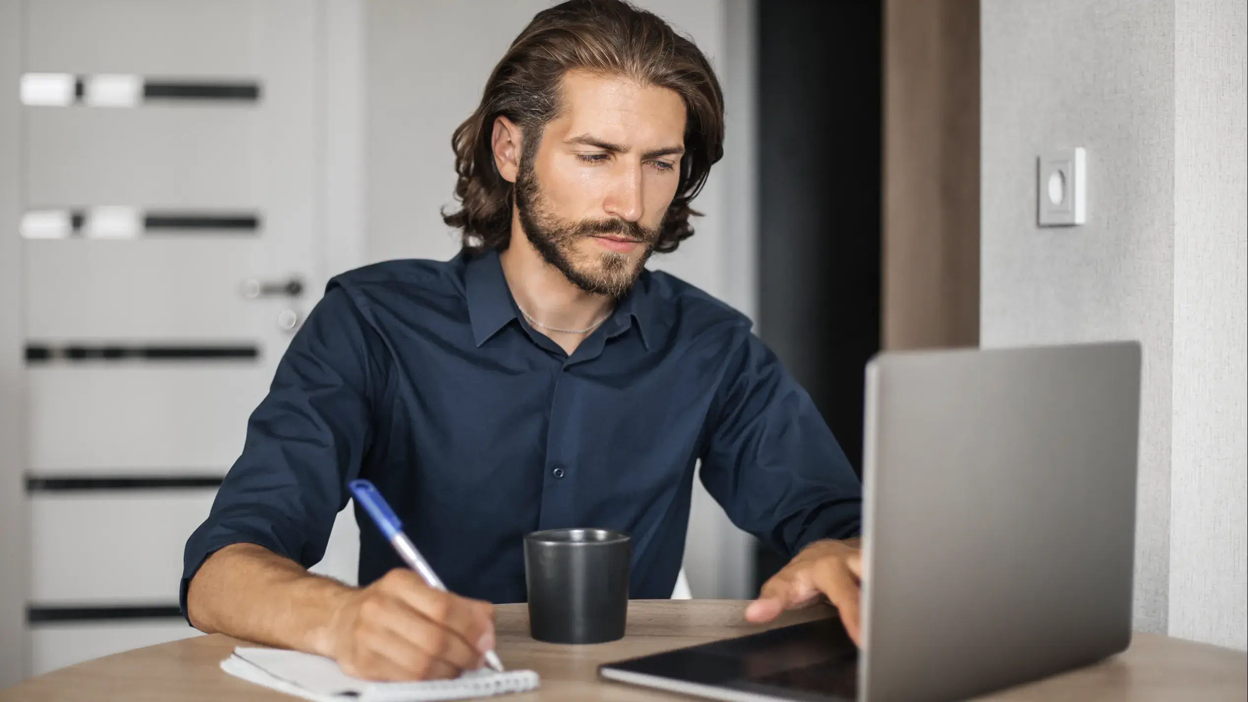 Man attending virtual information session