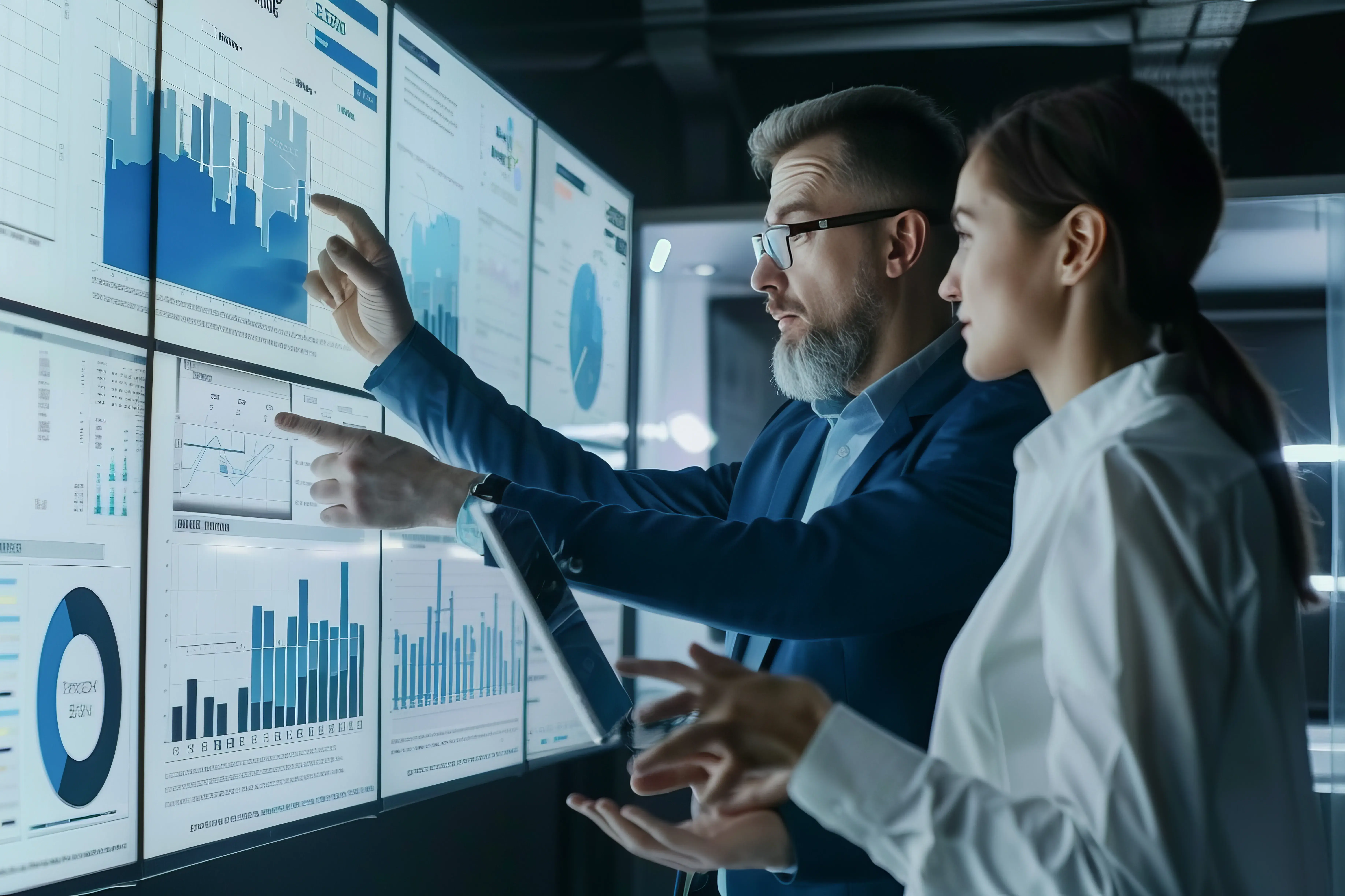 Two co-workers reviewing data
