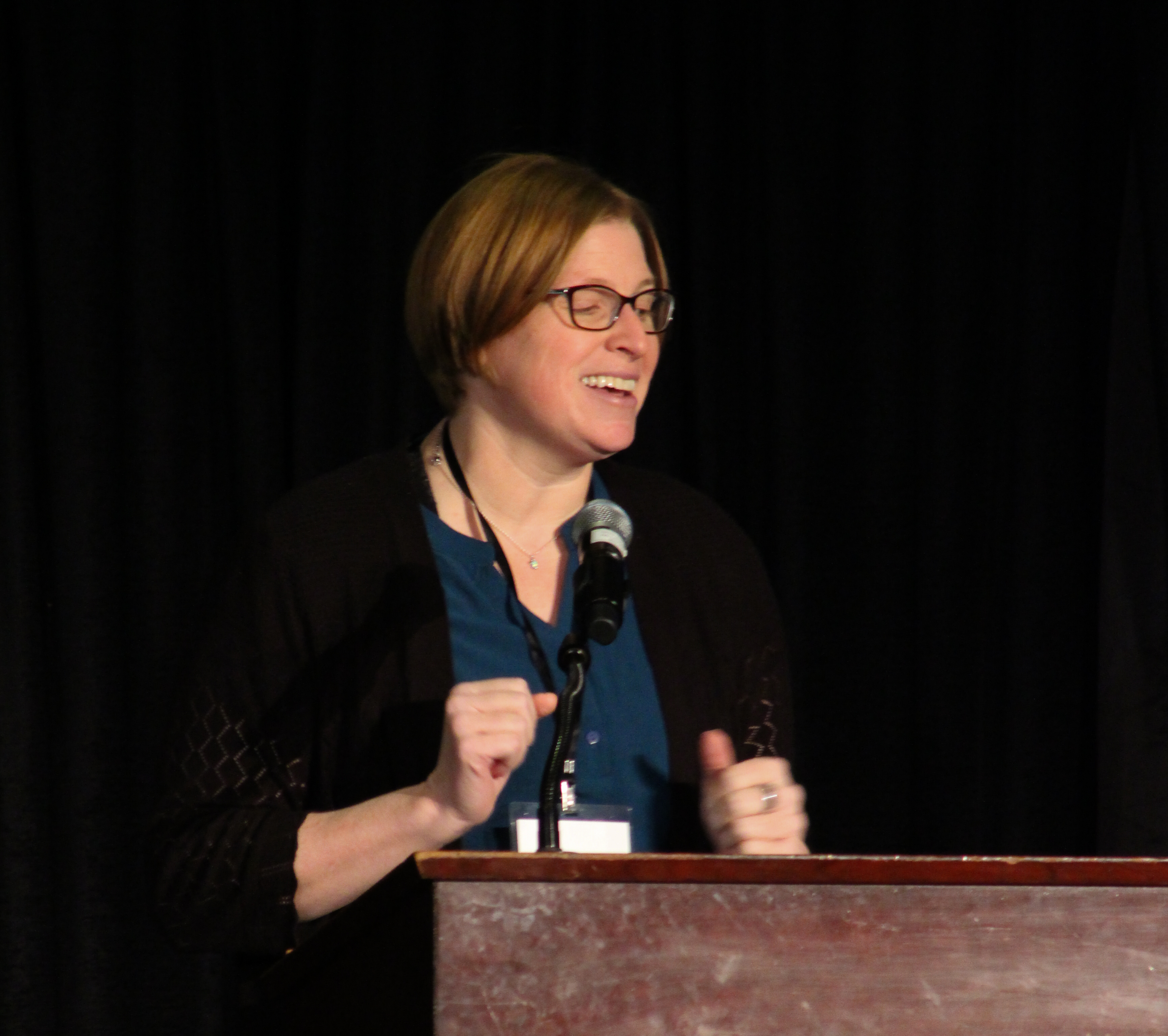 Person speaking at podium
