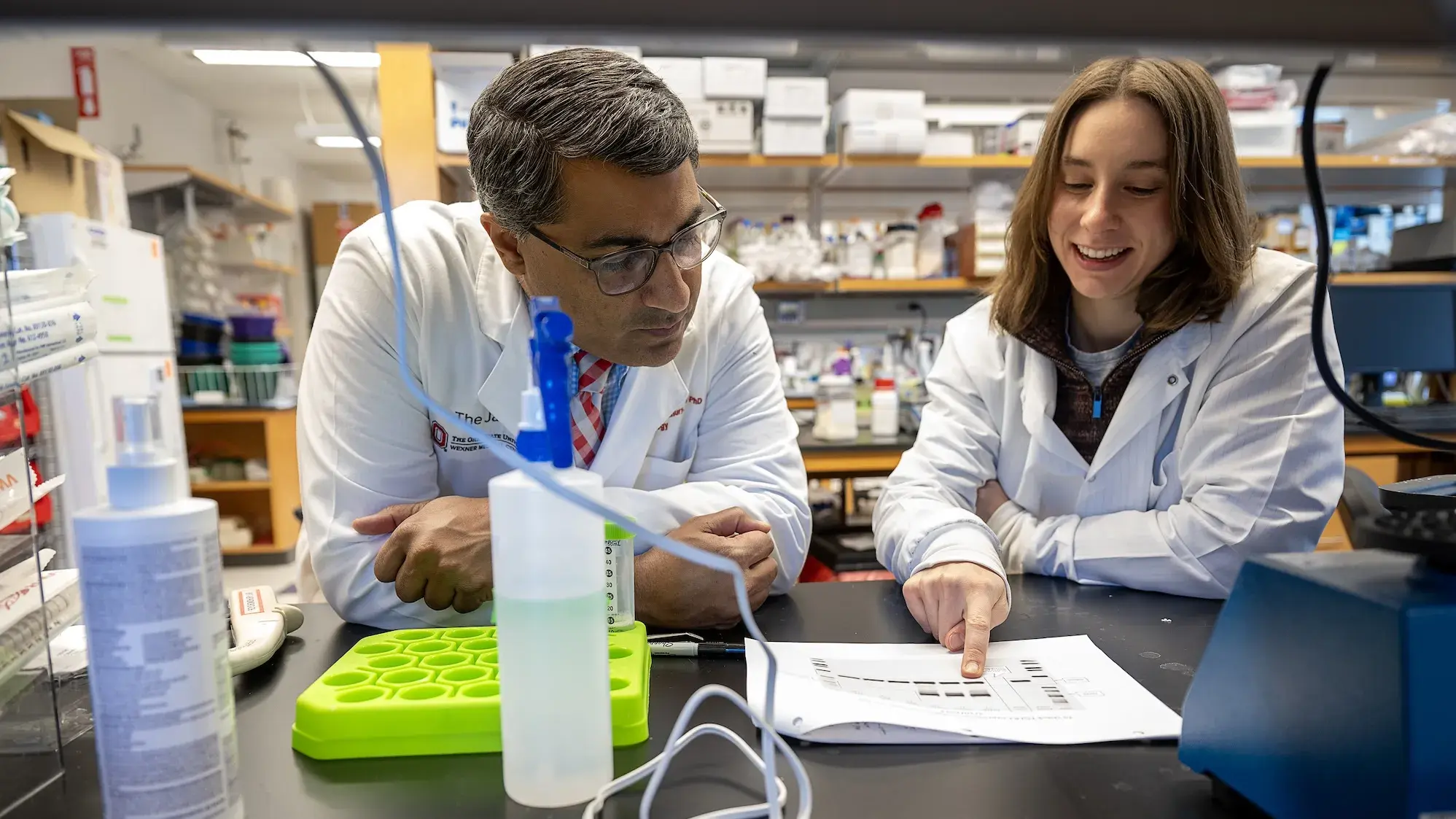 two doctors reviewing work in a lab