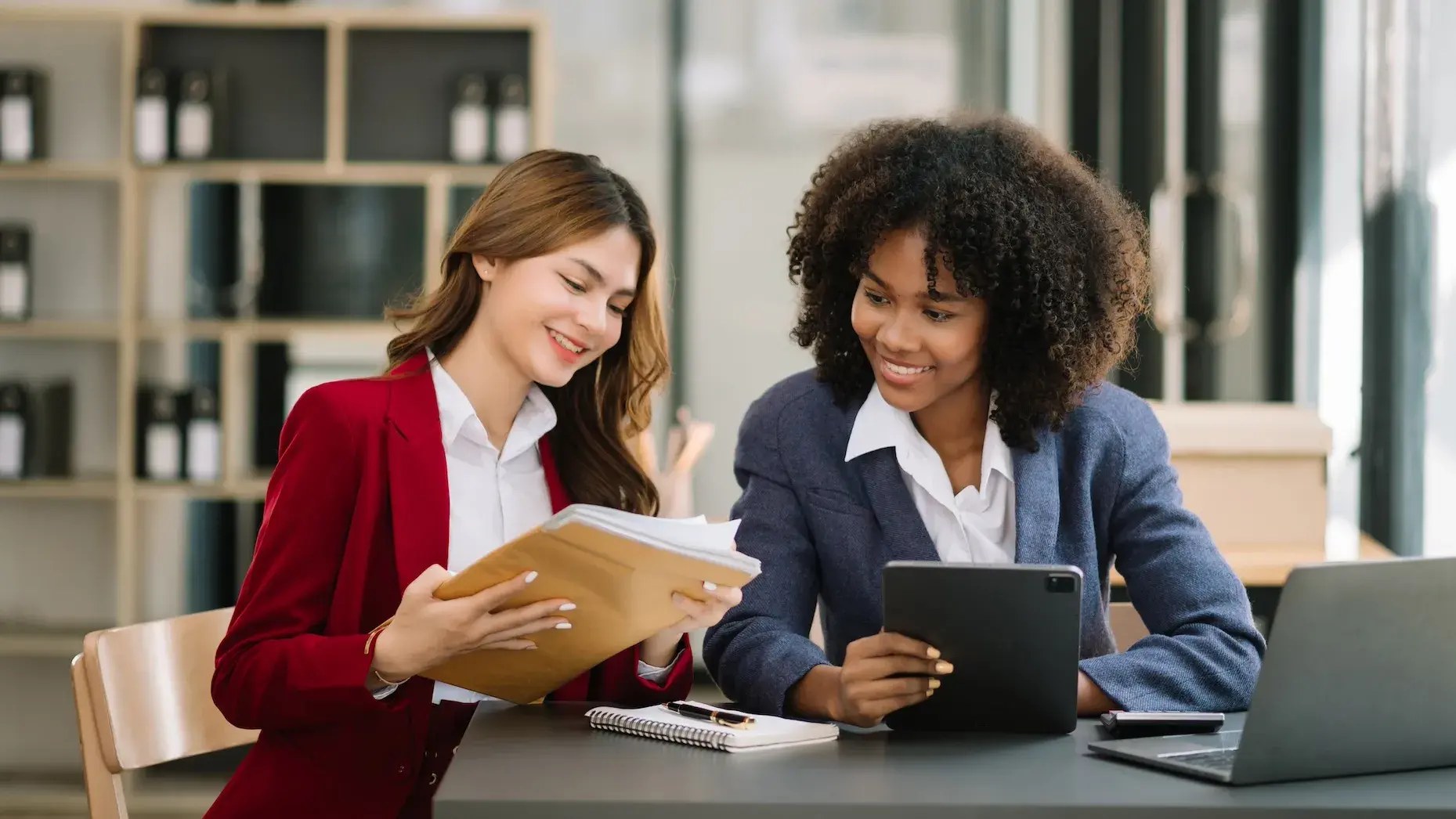 Two women working together