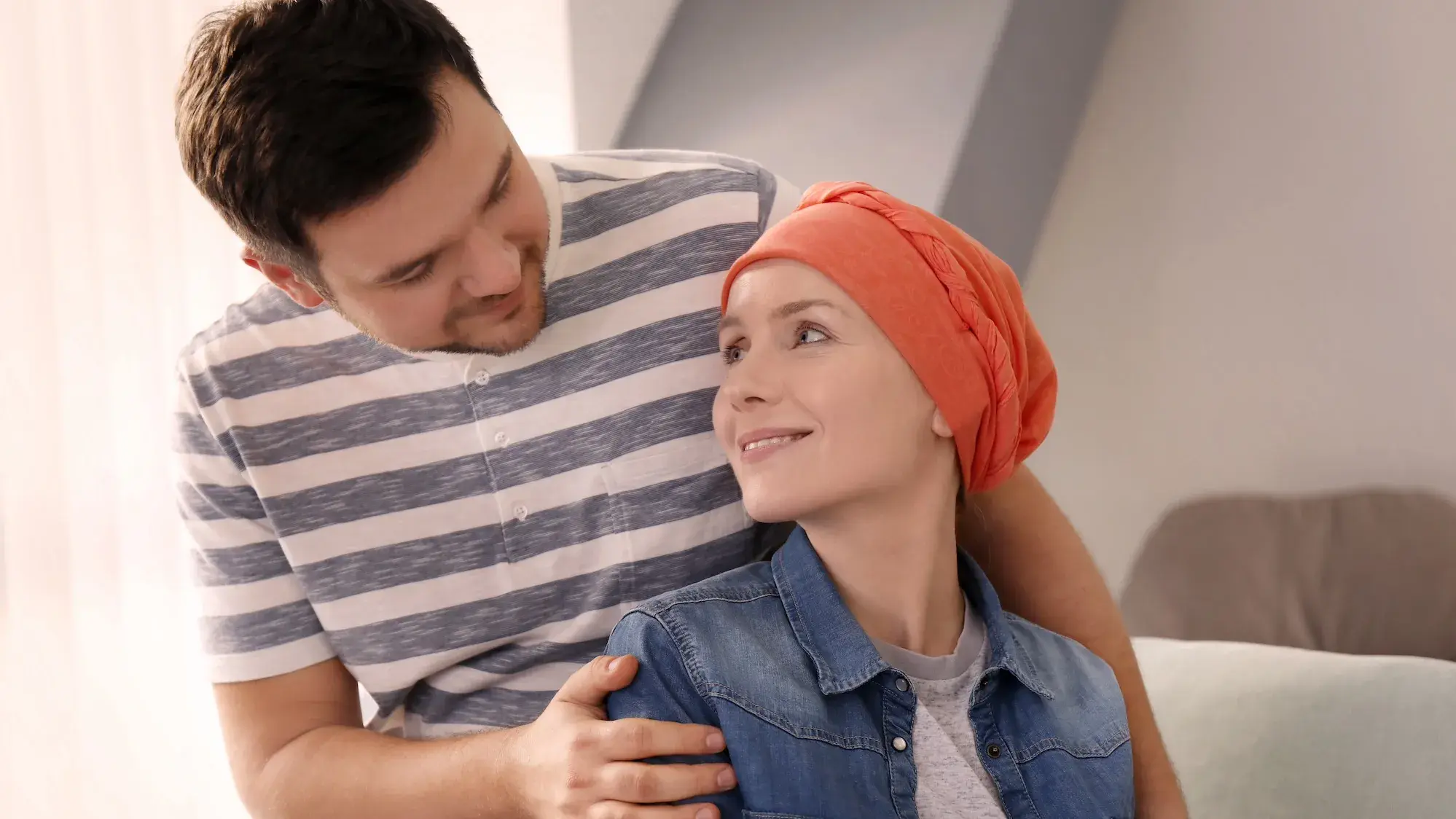 Young couple with woman that has cancer