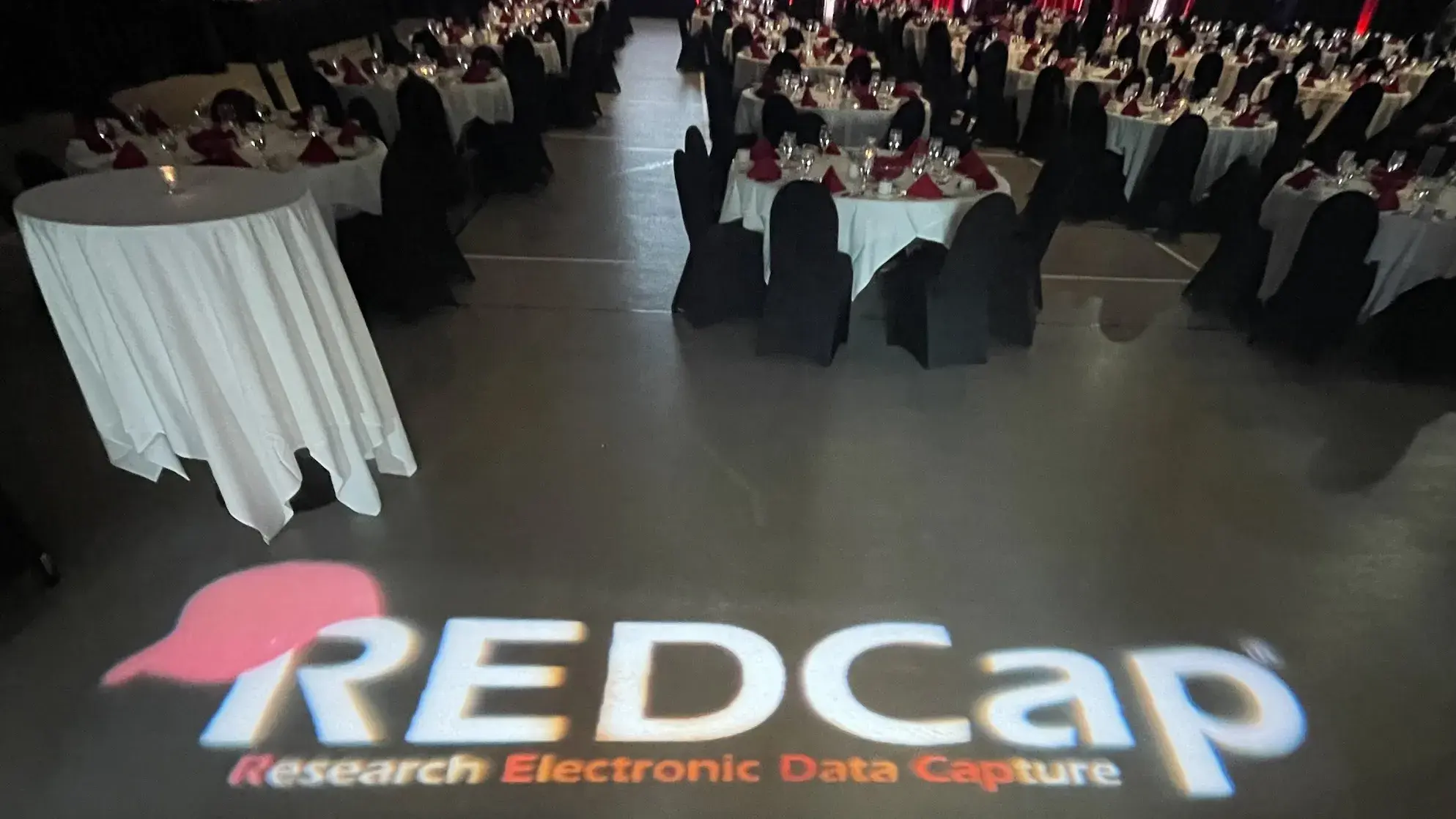 REDCap Con ballroom with tables 