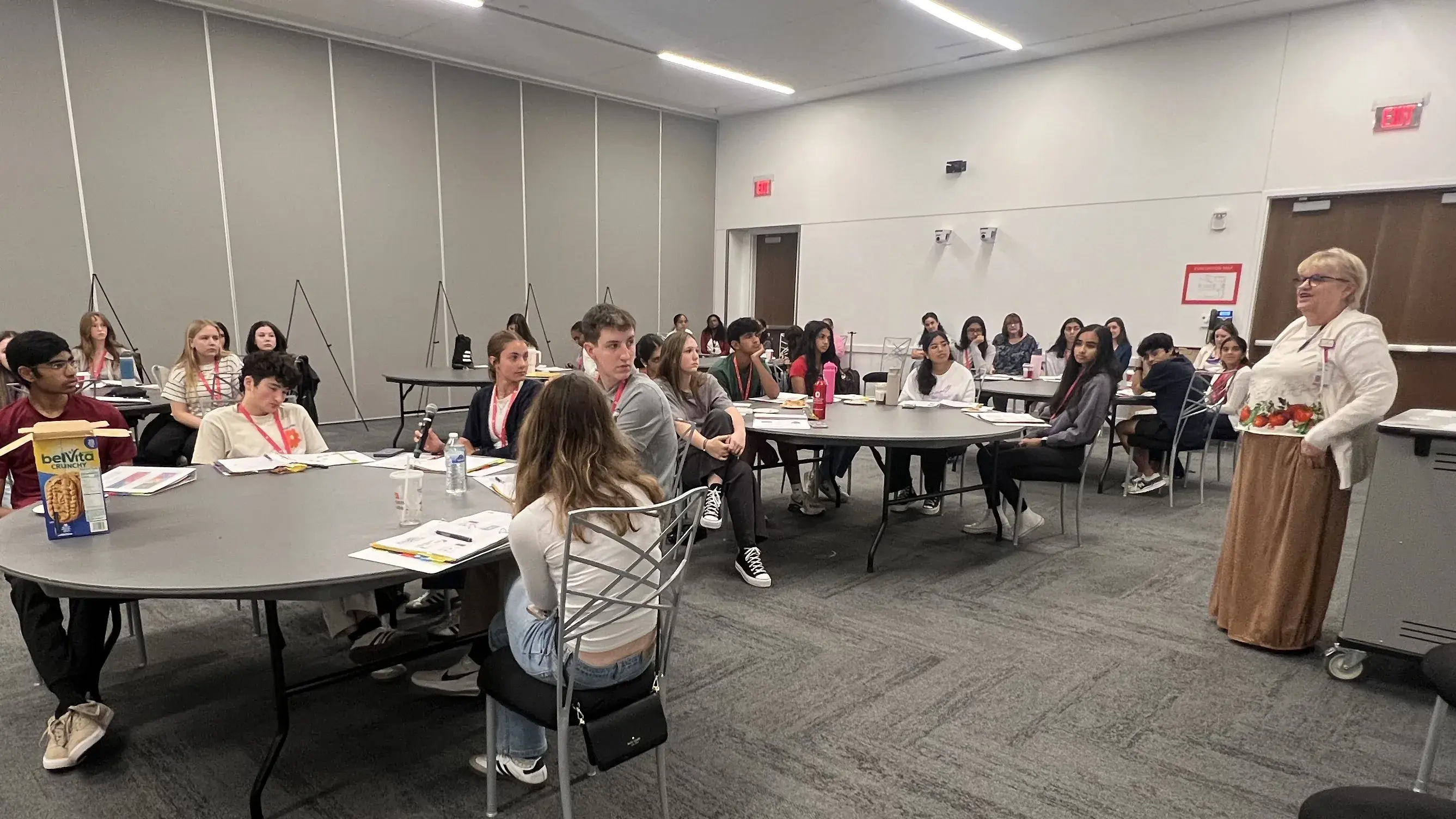 students listening to teacher