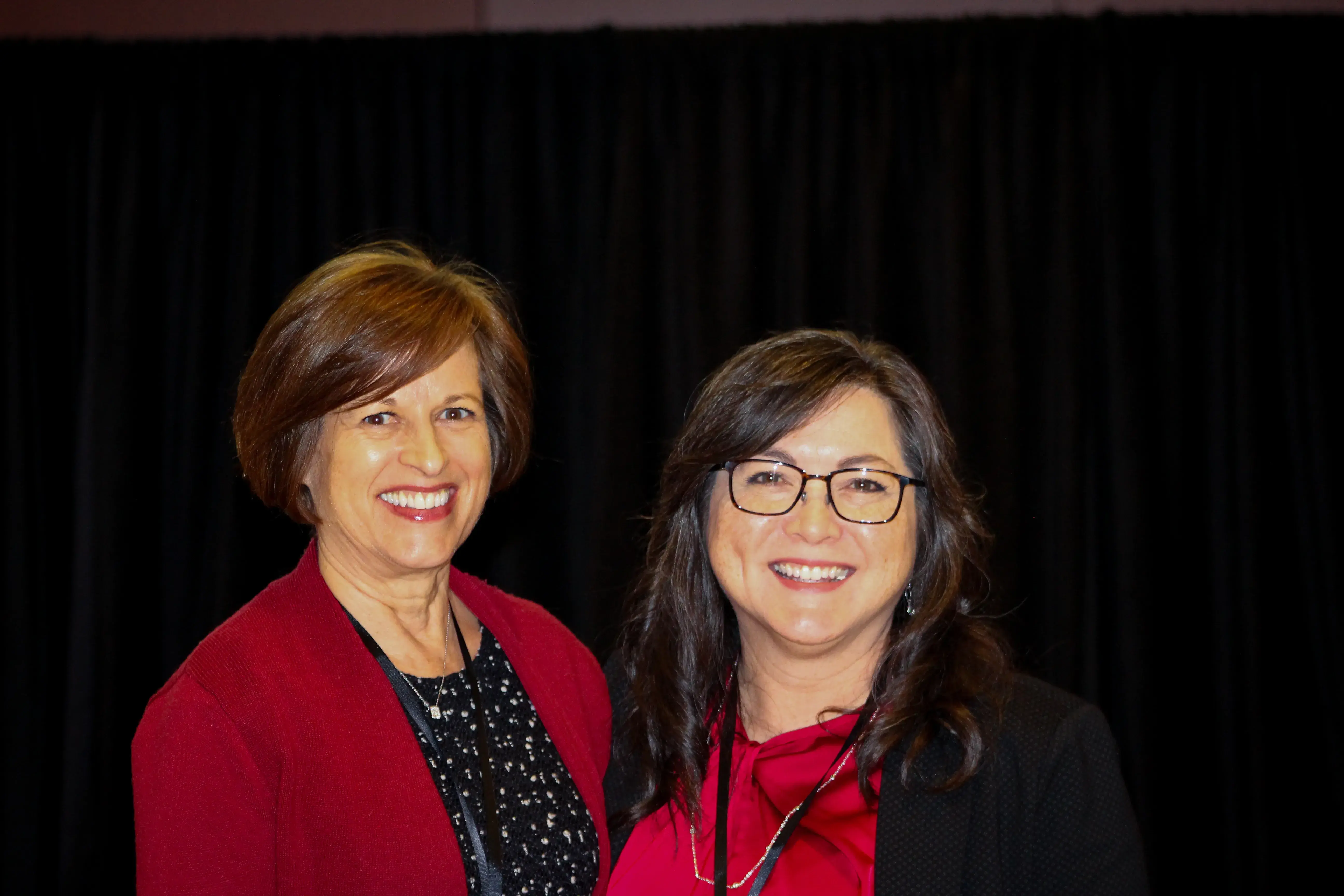 Julie Johnson and Cynthia Gerhardt smiling for picture