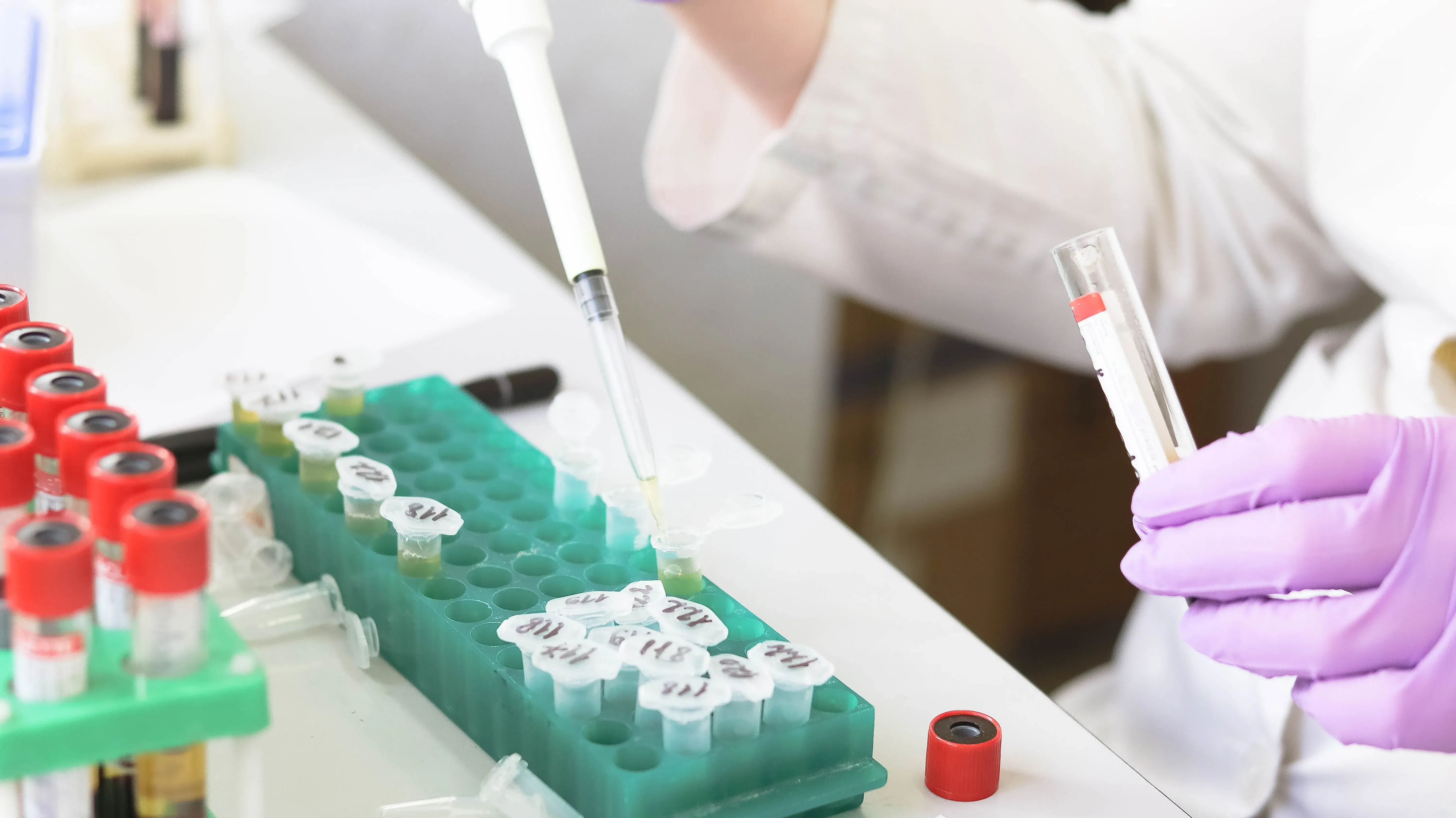 investigatory working with vials of samples 