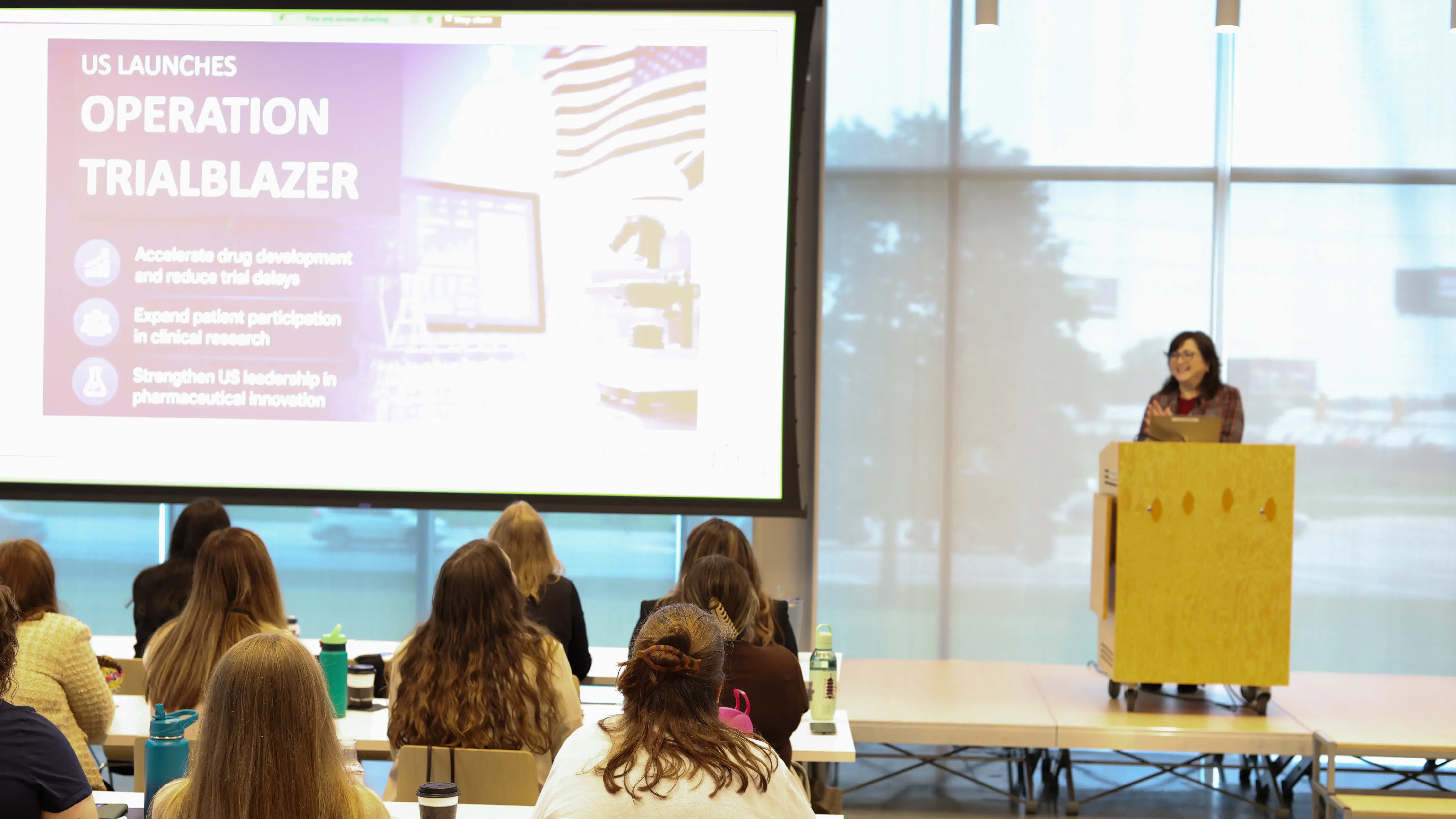 Cynthia Gerhardt addressing attendees during elevate