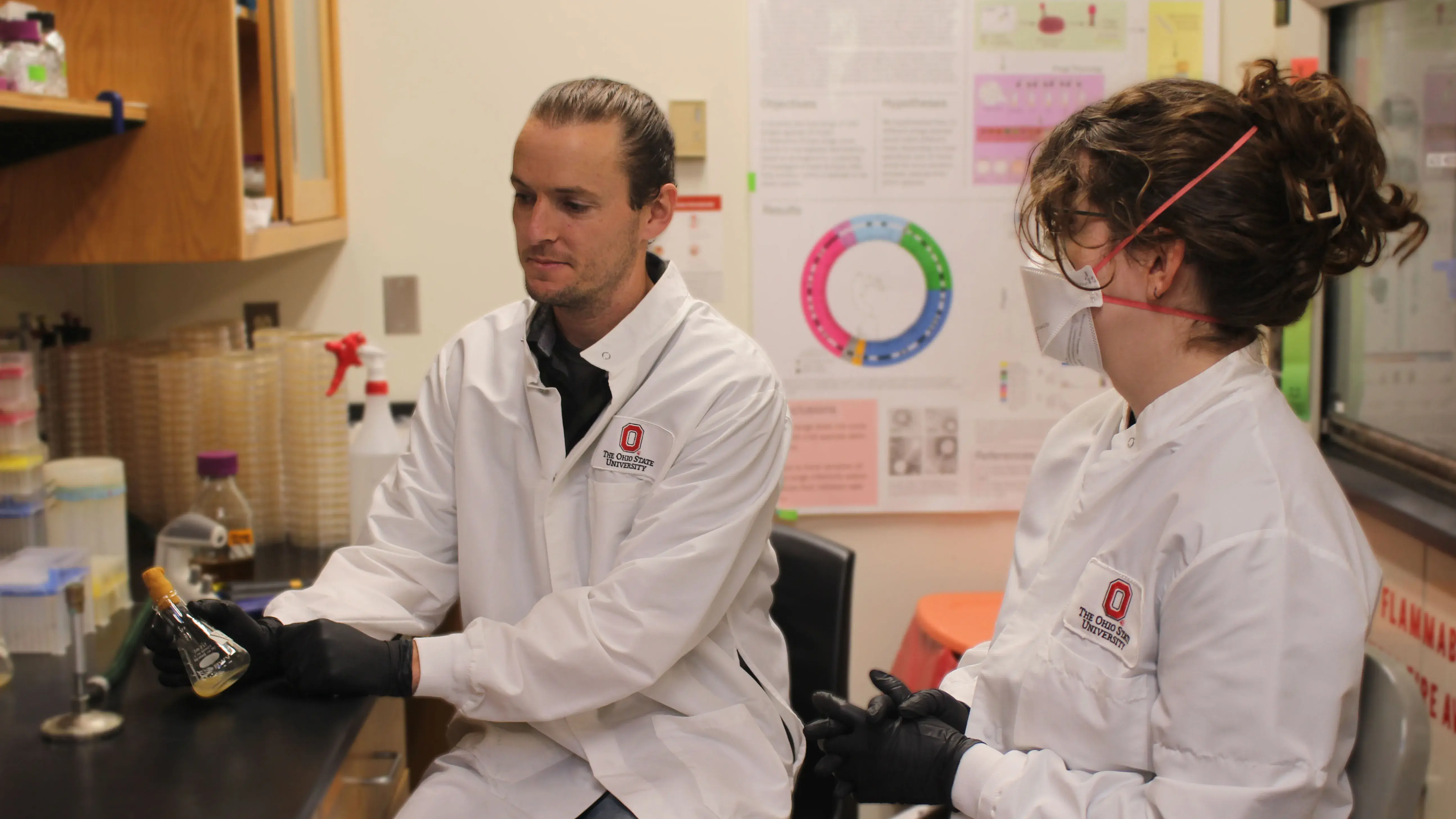 Garrett Smith explaining microbiomes to med student