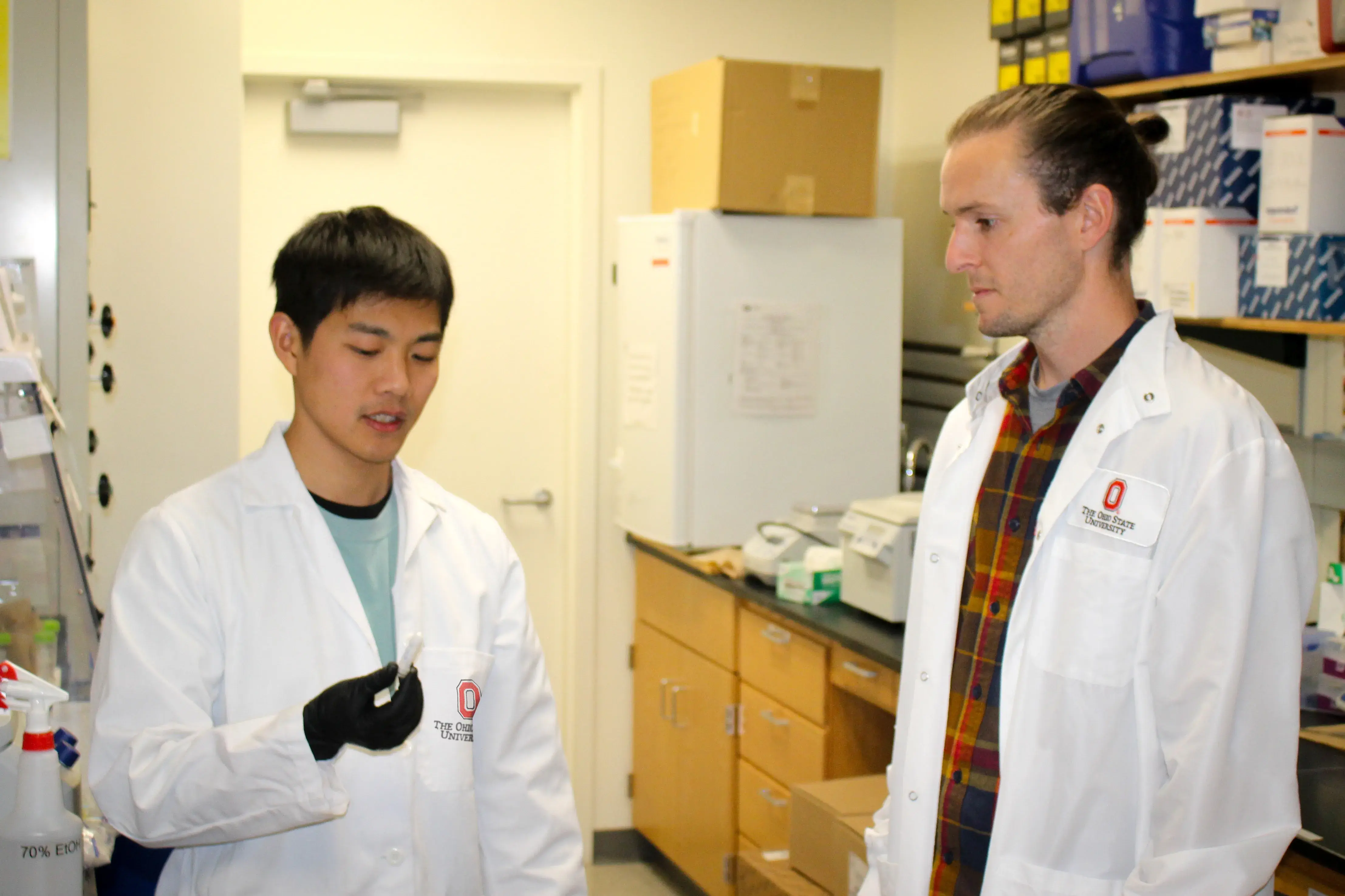 Dr. Garrett Smith interacting with scientist